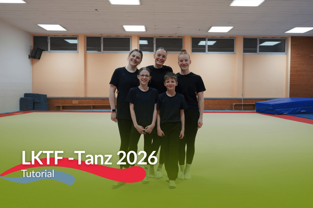 Die Tanzgruppe schaut in die Kamera.